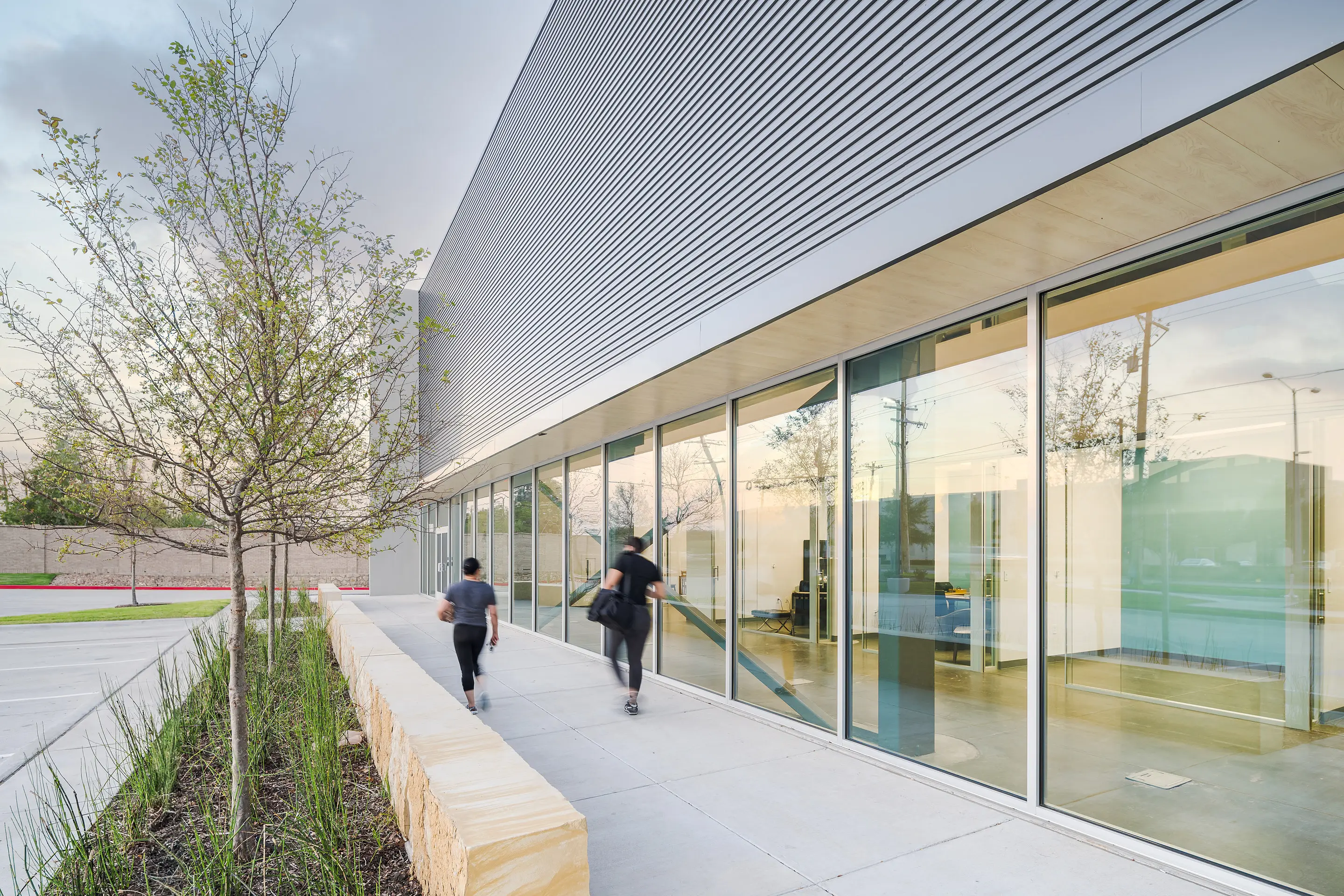 The glazed corridor along the WesternTechSystems facility frontage